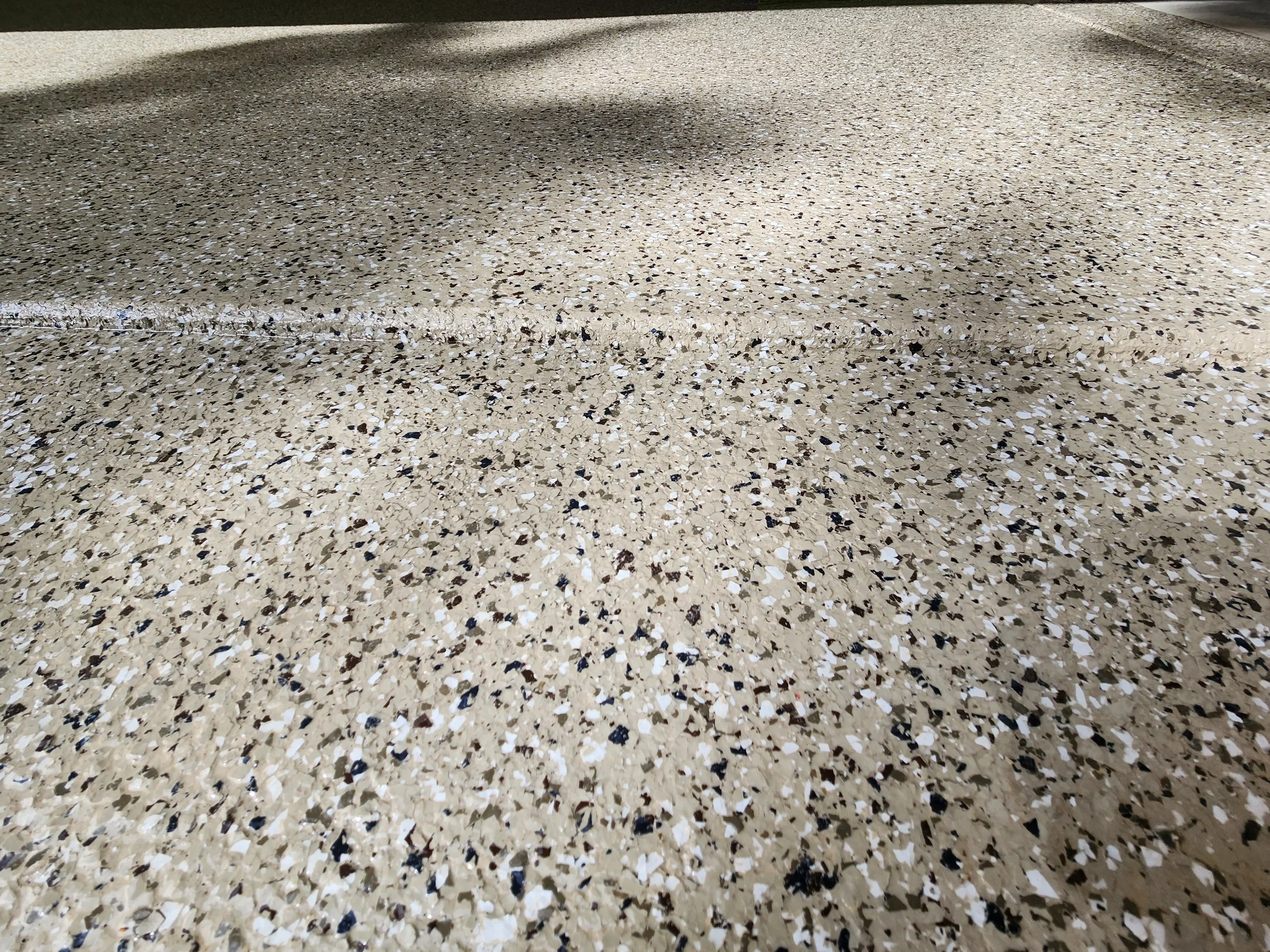 Beige Flake Flooring Garage