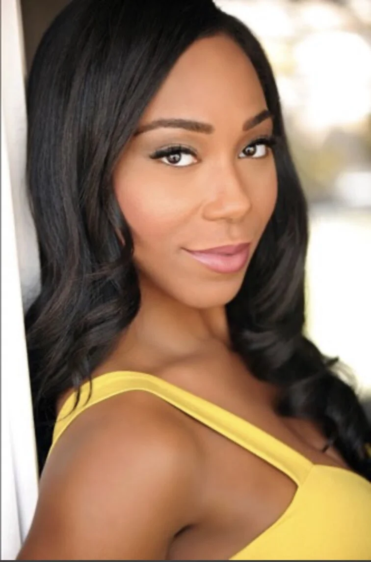 yellow headshot .jpg