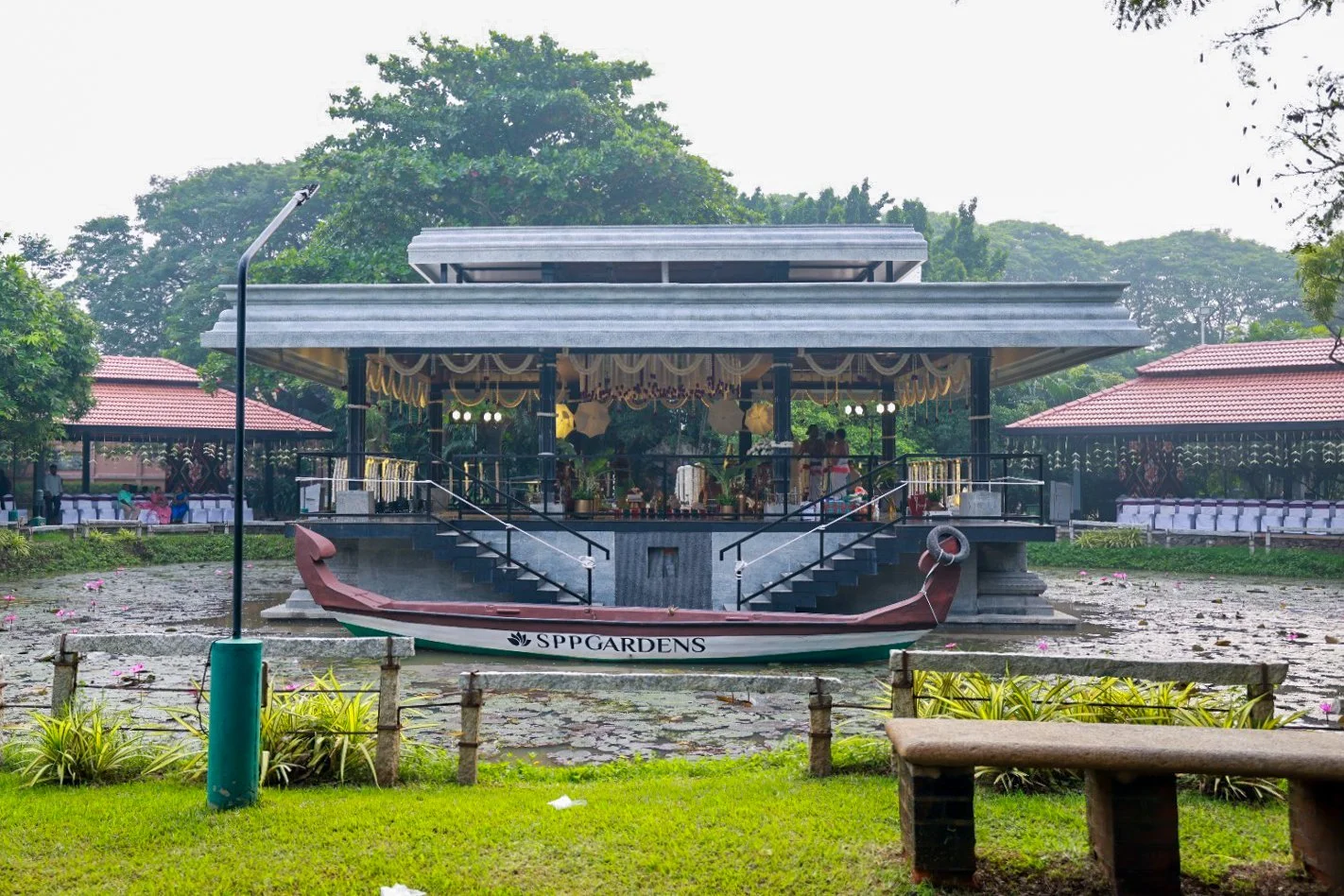 Hanu Reddy Pushpa Island water mandap wedding setup surrounded by lily pond at SPP Gardens