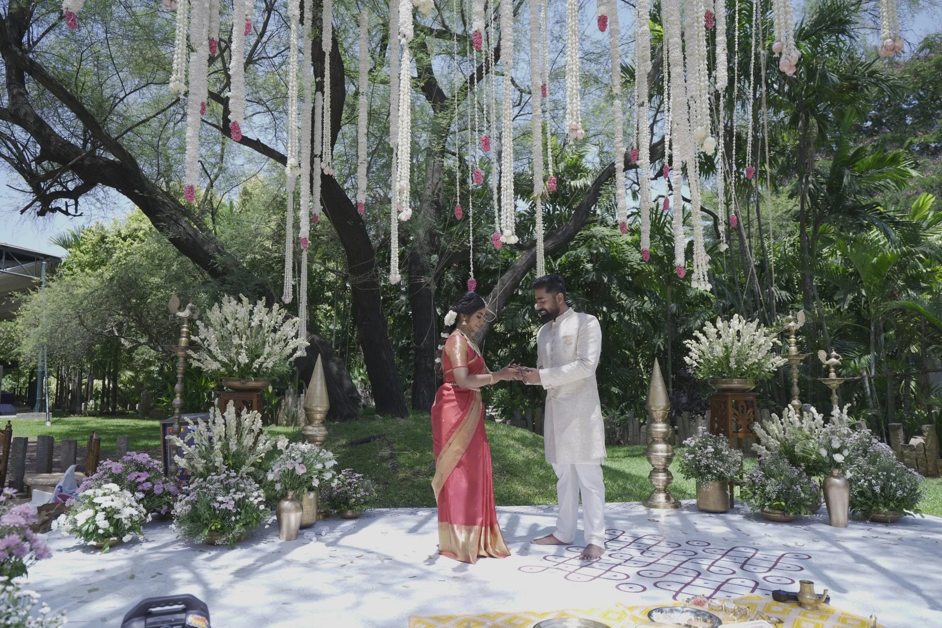 Gen Z couple at nature wedding venue with open lawn and greenery at SPP Gardens Chennai