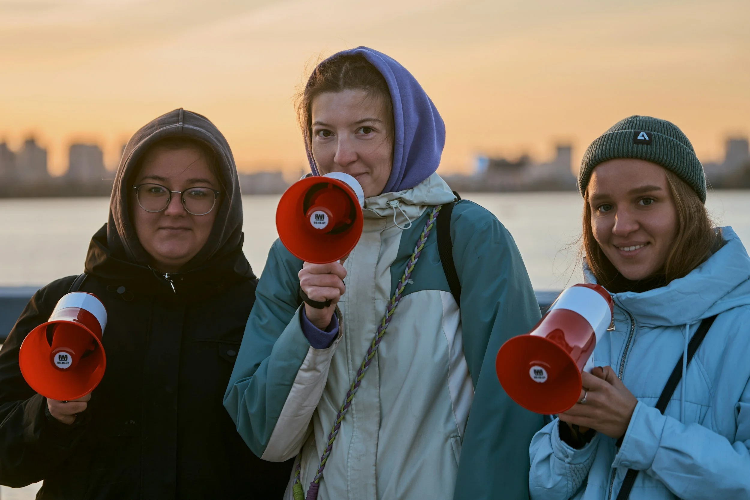 activist women with megaphones