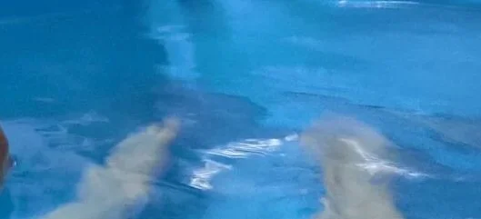 Amy McKaughan baby first bath following birth in pool small.jpg