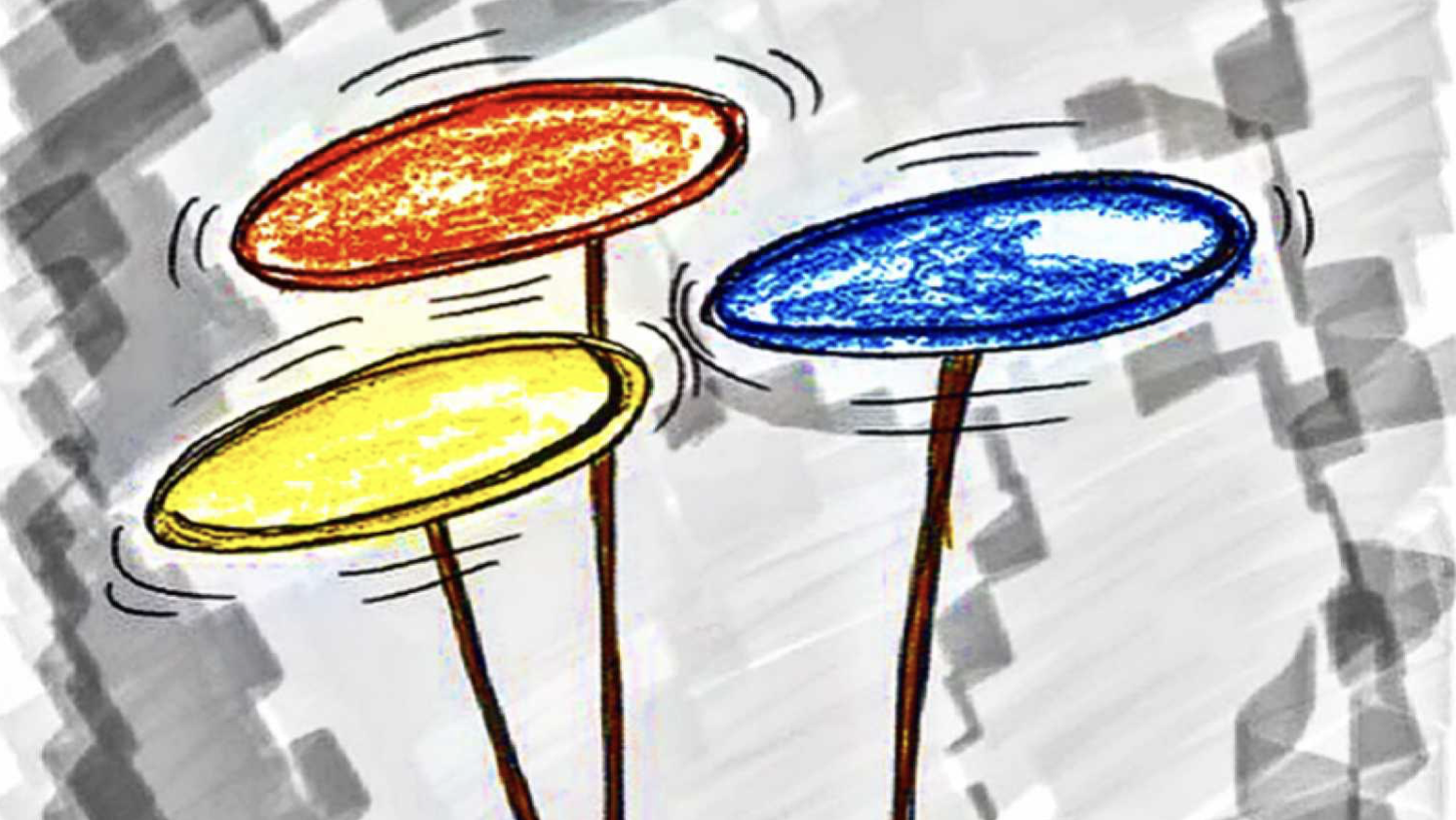 Image of red, blue and yellow spinning plates.