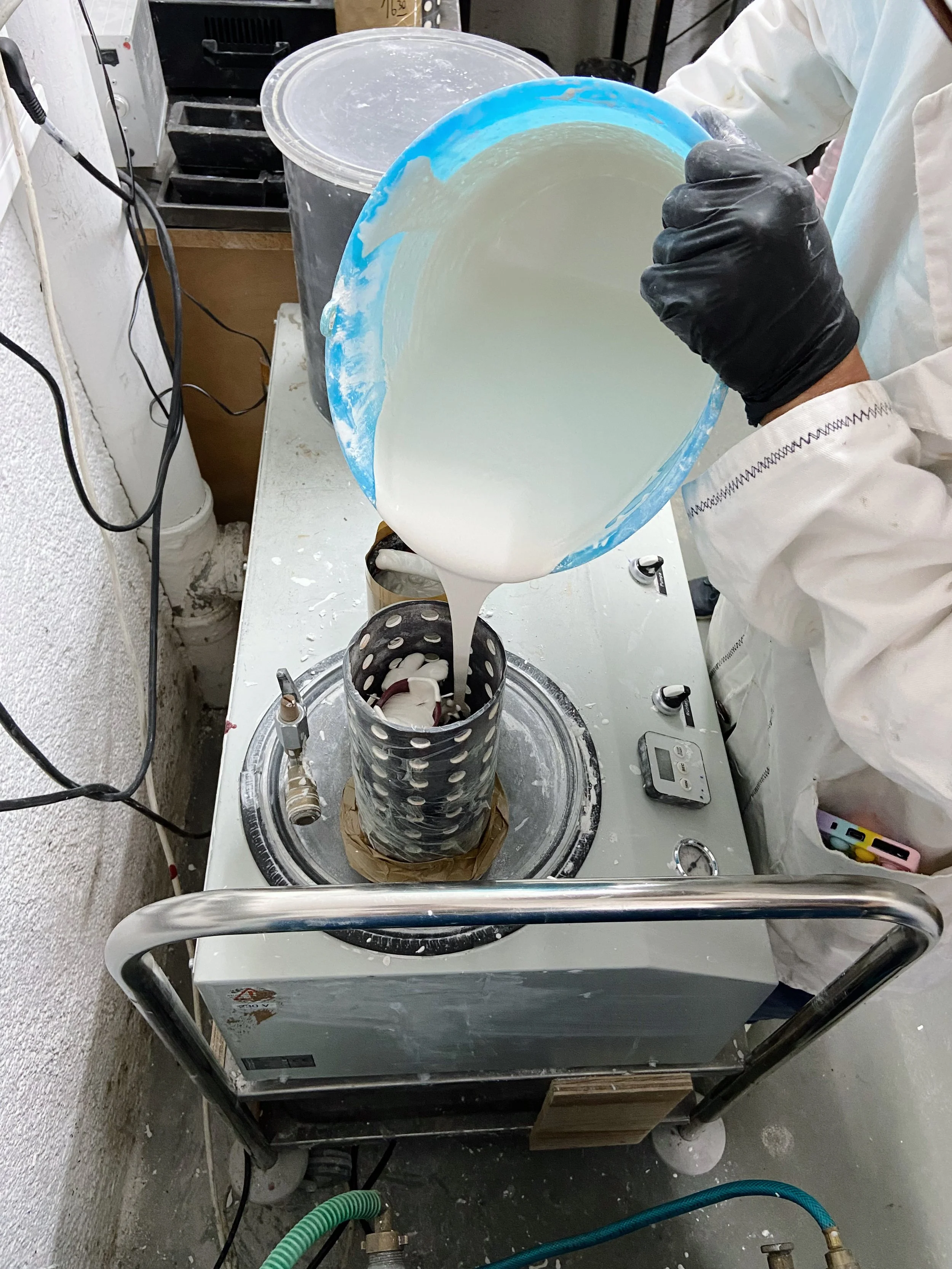 Embedding the wax in preparation for casting