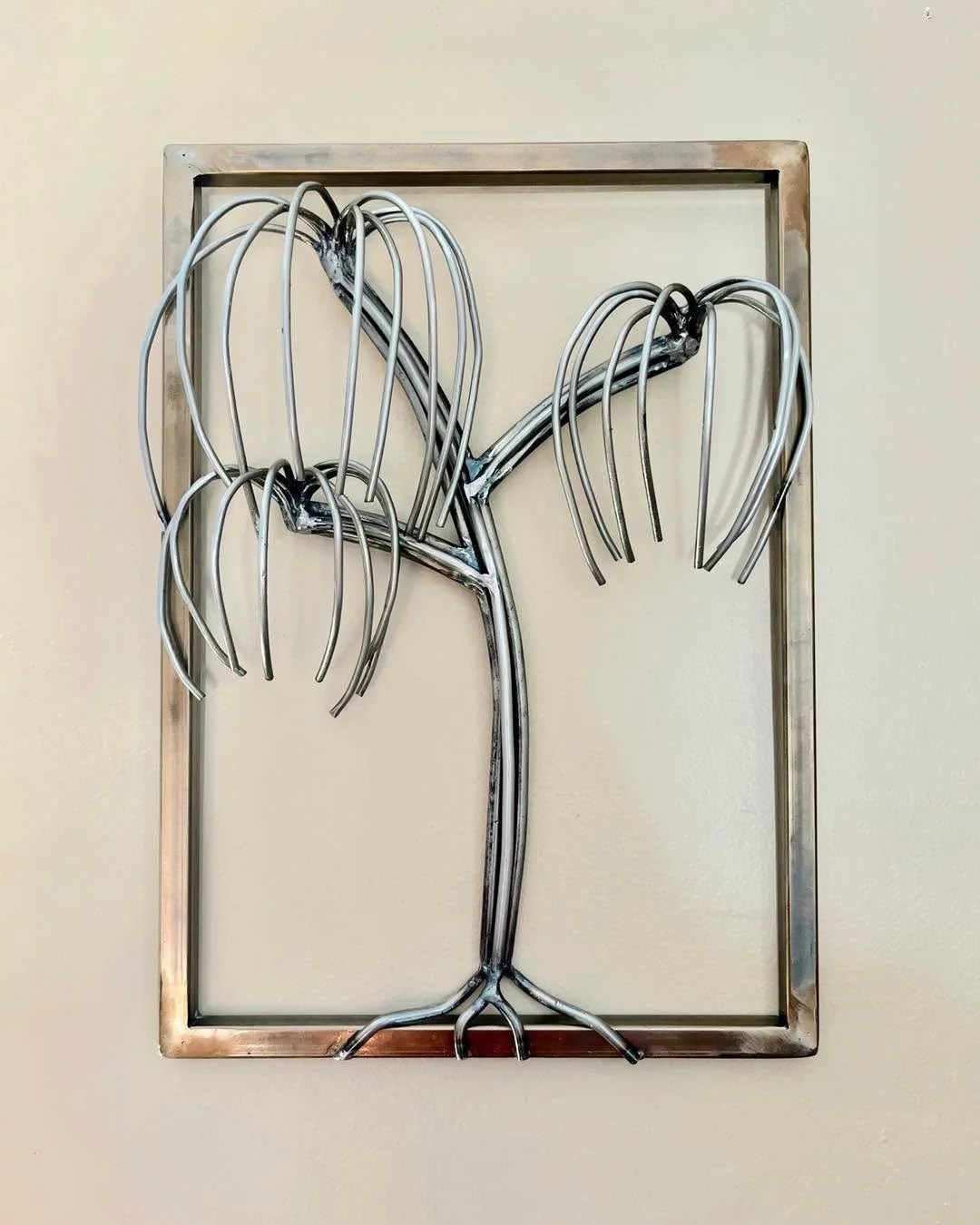 Weeping Willow in heat colored frame 

#thelittleredweldingshop #womenwhoweld #femalefabricators #fabrication #welding #custommade #fabrication #metalart #alabamaartist #treeart