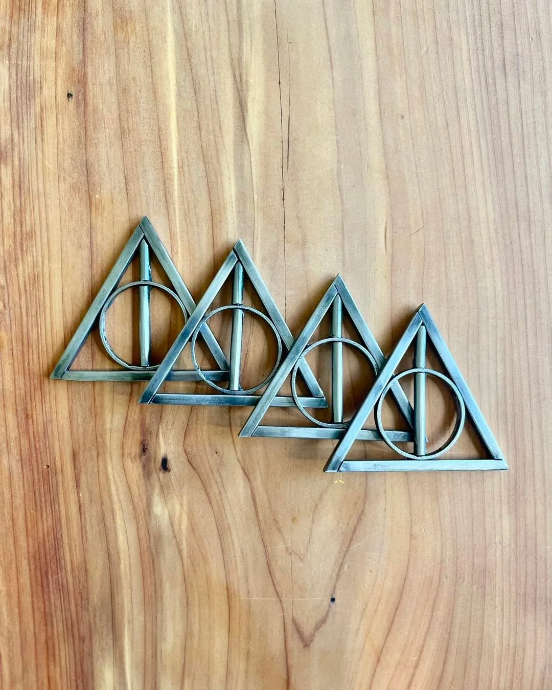 FOR SALE&hellip;Deathly Hallows 

Dimensions: 3&rdquo; H x 3&rdquo; W

$25/each

. . .

For other offerings, visit littleredweldingshop.etsy.com

#custommade #welding #thelittleredweldingshop #femalefabricators #customart #womenwelders #fabrication #