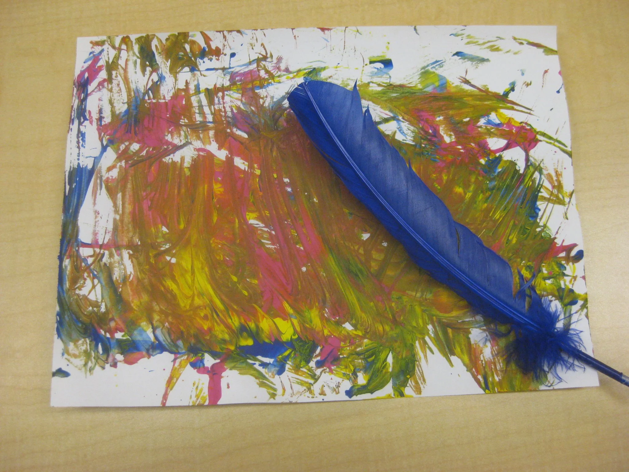 Painting with a feather.