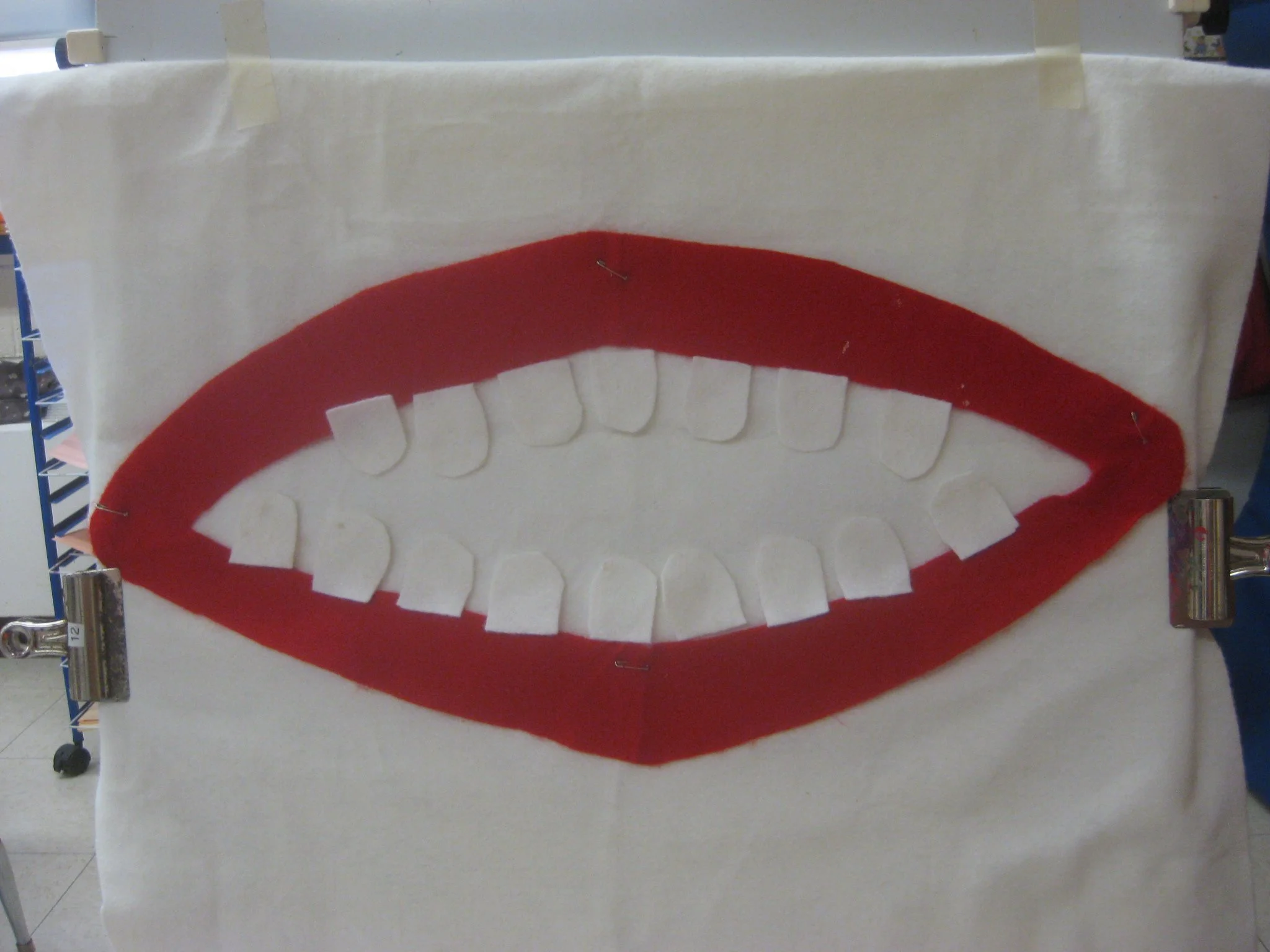 Felt mouth with lots of teeth.