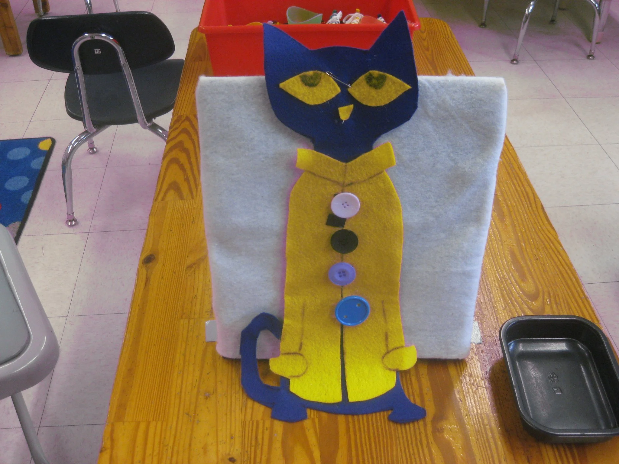 Felt Pete and his buttons