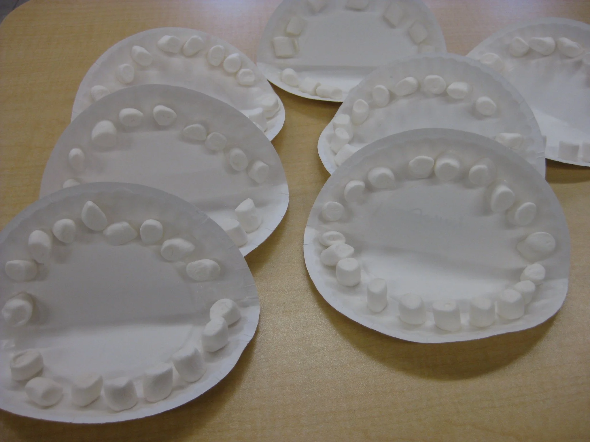 Mouth with marshmallow teeth.