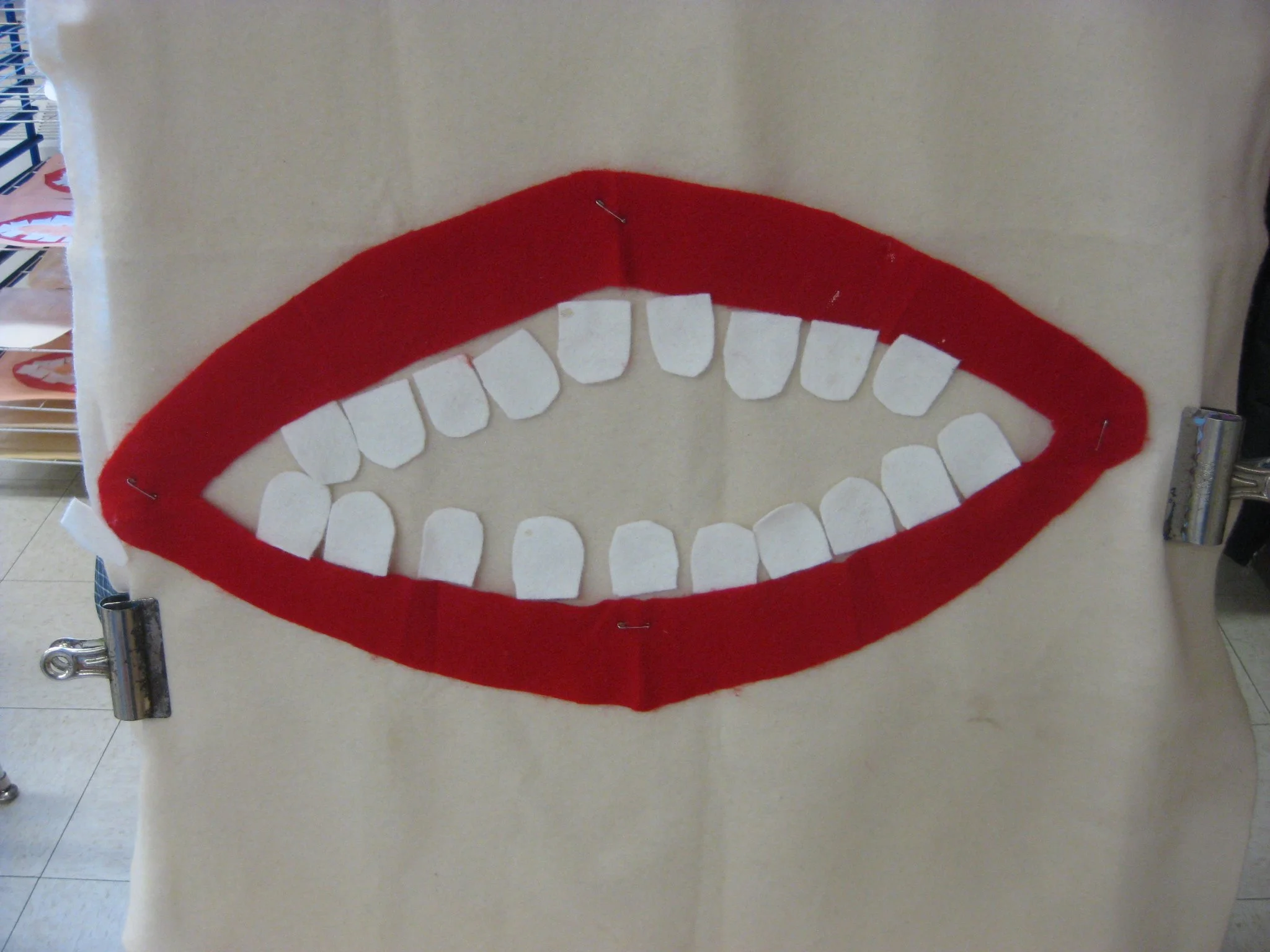 Felt mouth and teeth.