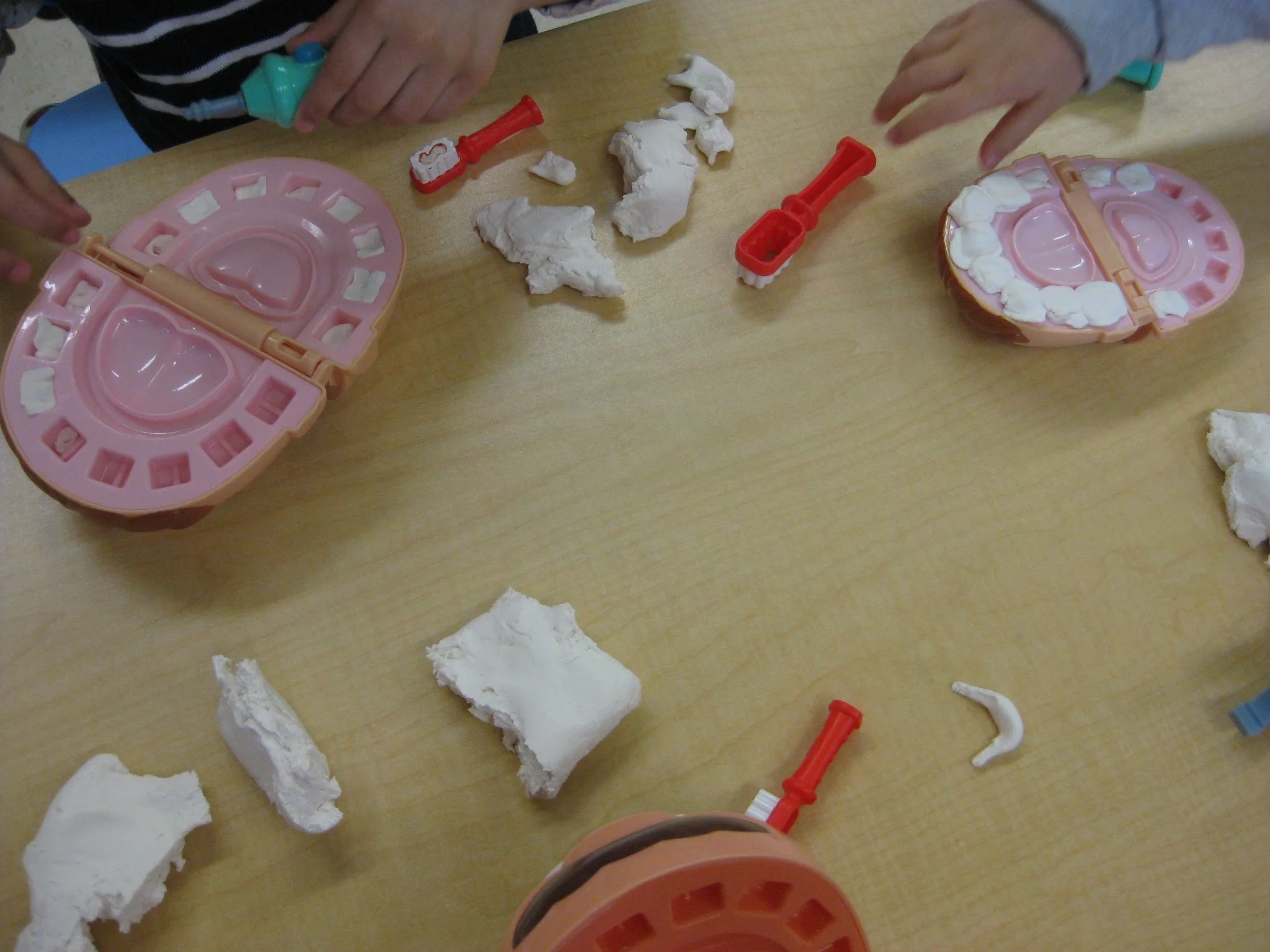 Dental care with play dough toys.