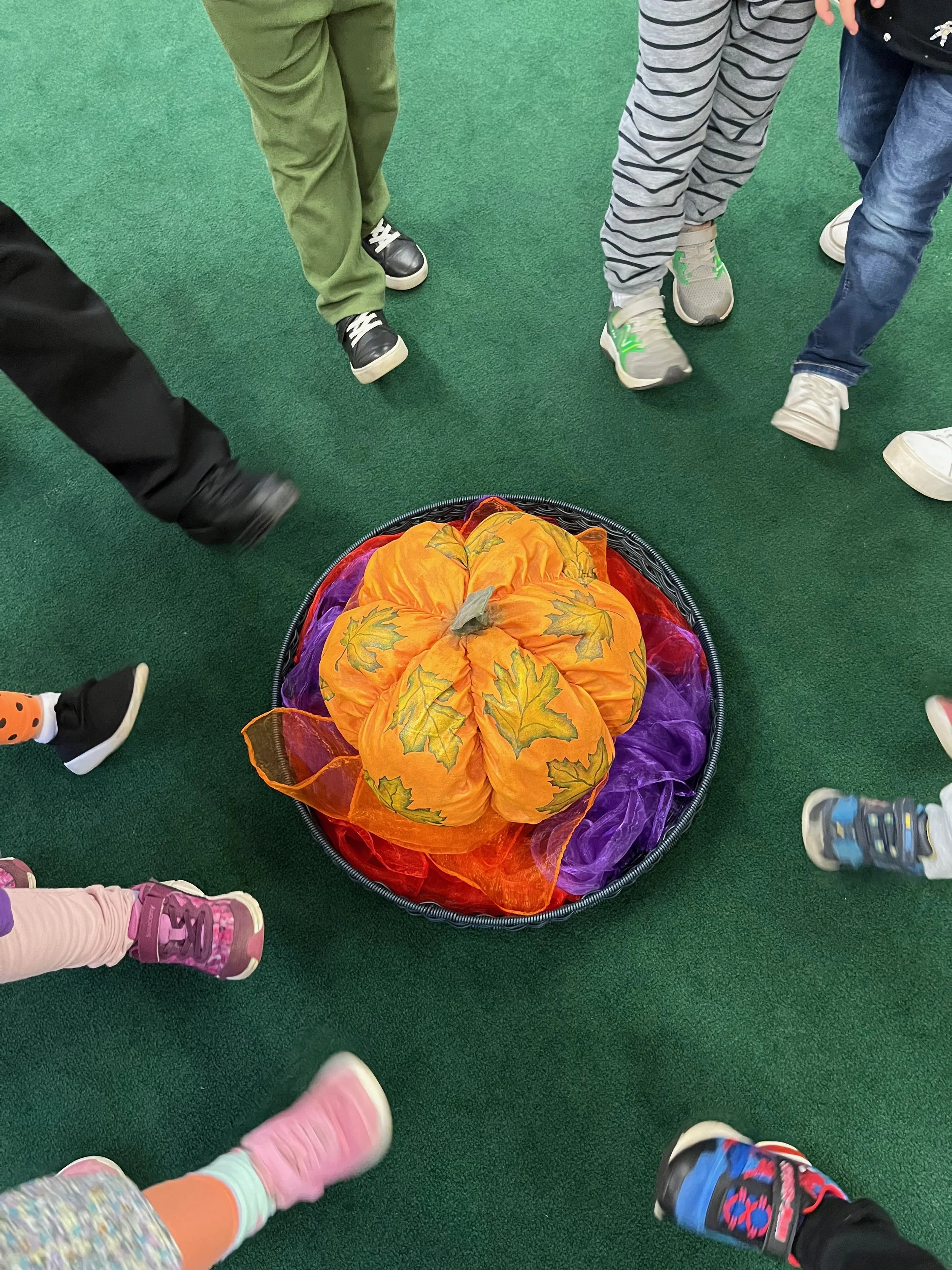 dancing around the pumpkin