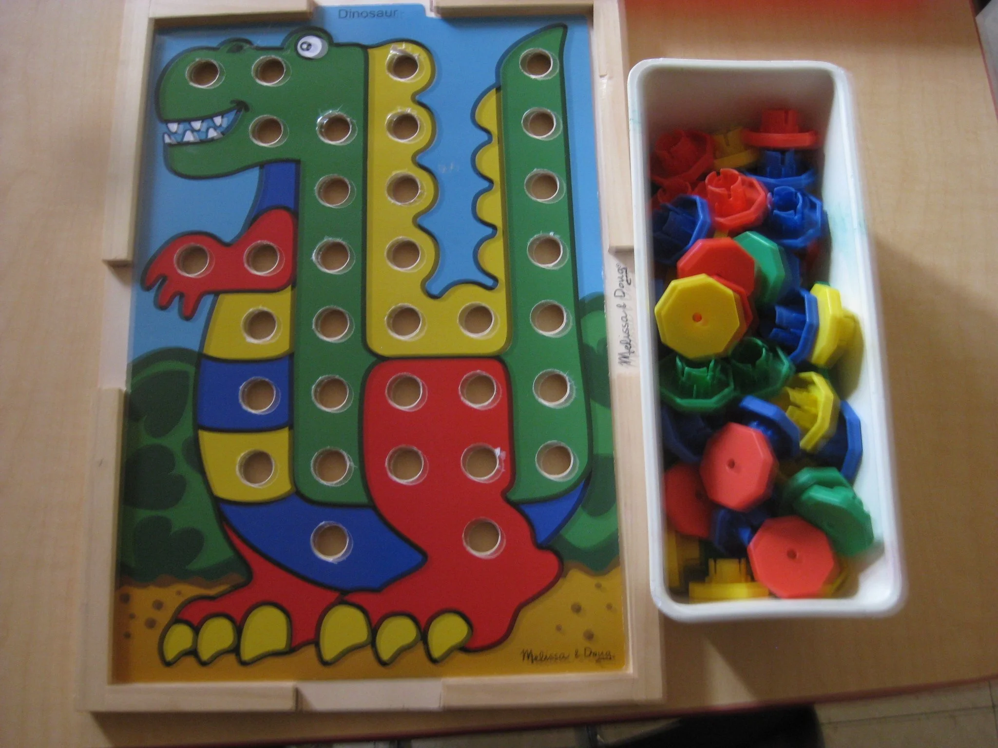 Dino with pegs