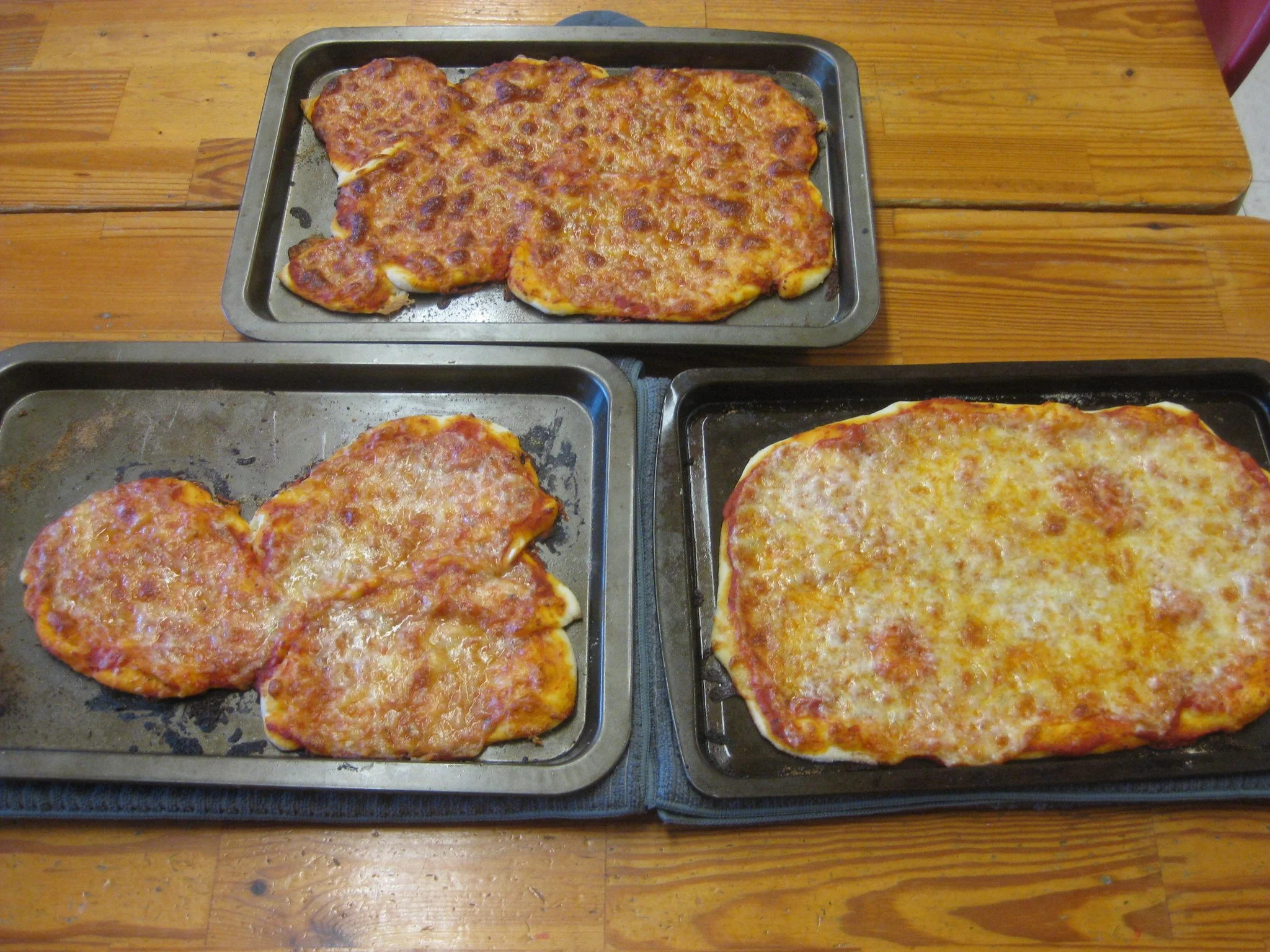 The children and teachers loved eating the pizza.