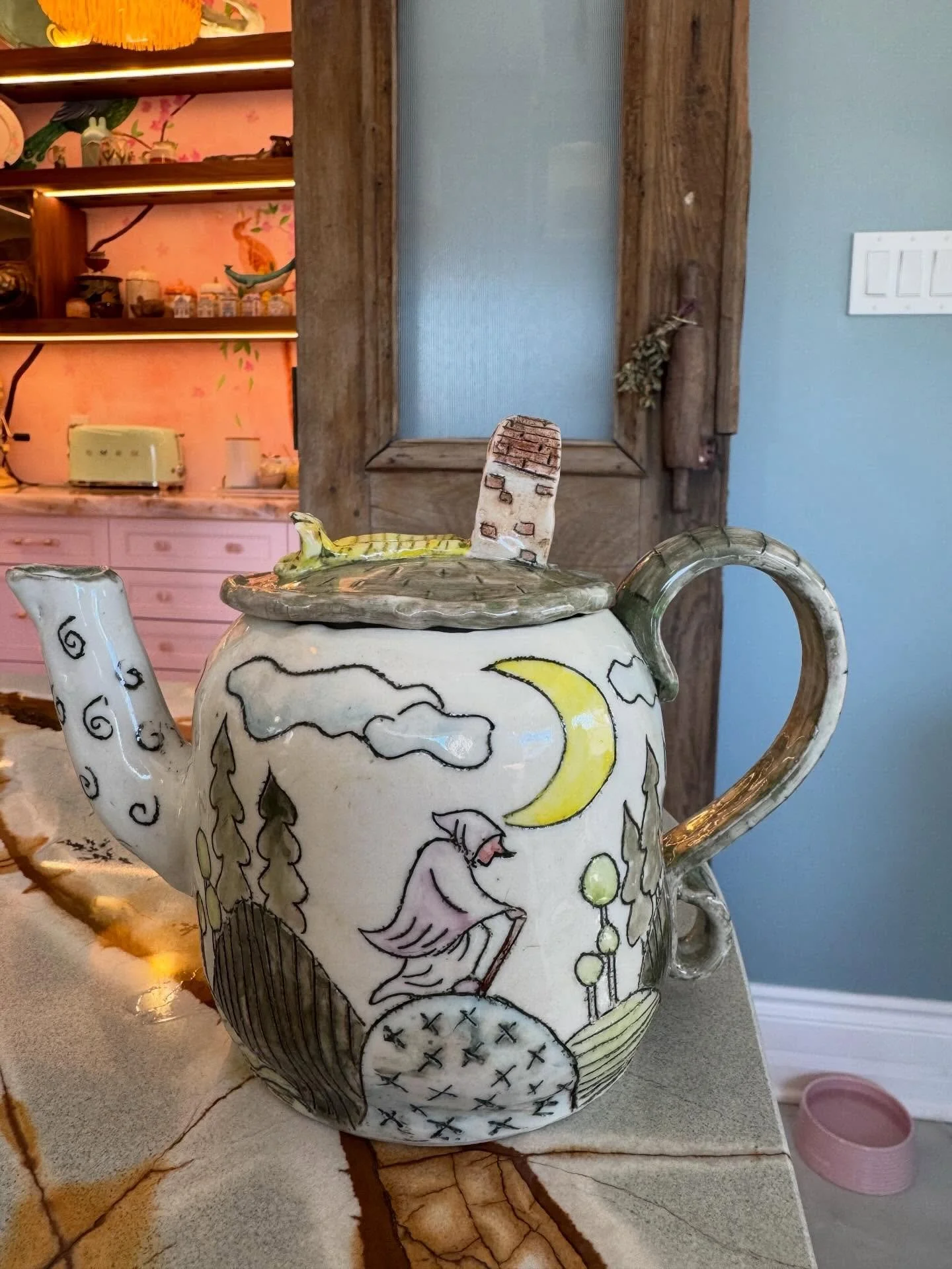 Baba Yaga returns, in this third teapot of the series! My intention is to celebrate and appreciate women of history and lore who were ungovernable, who were their fulfilled hag selves. Illustrating this on a teapot&mdash;an object intrinsically linke