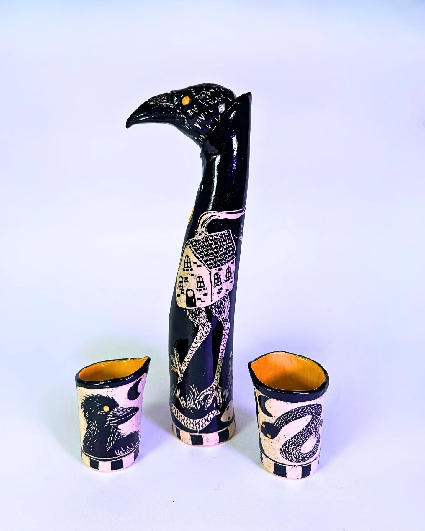 Babayaga crow decanter and cups: some of my renown sgraffito work mixed with my organic handbuilding shapes and a great sculpted stopper! I love everything about this set. 

The babayaga makes several appearances in my recent work. When I was away at