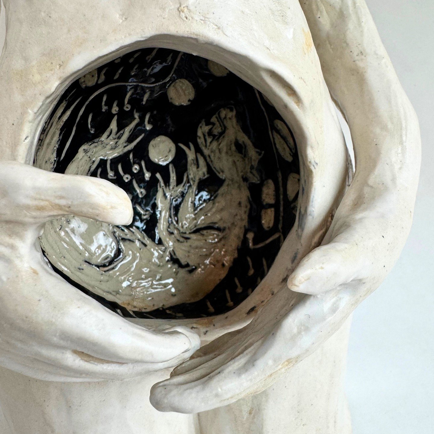 Close-up shot of the belly on "Holding the Space". I made this piece while reflecting on all the savage and inhumane things that we with wombs are forced to do, in order to 'tame' this wild piece of our bodies. 

Birth control pills, IUDs, 