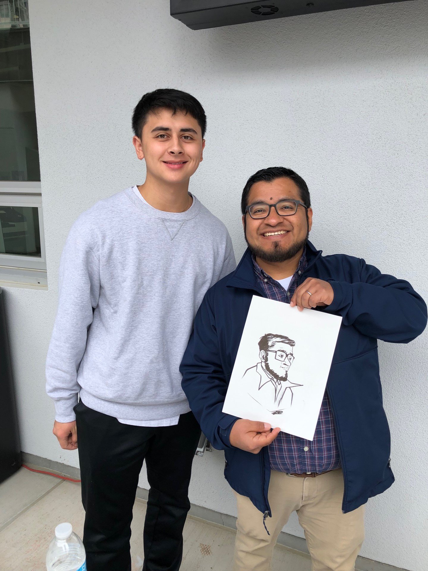 students drawing caricatures