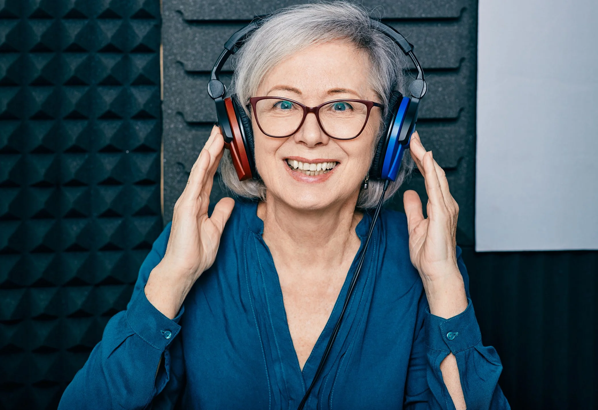Woman wearing headphones during a hearing test