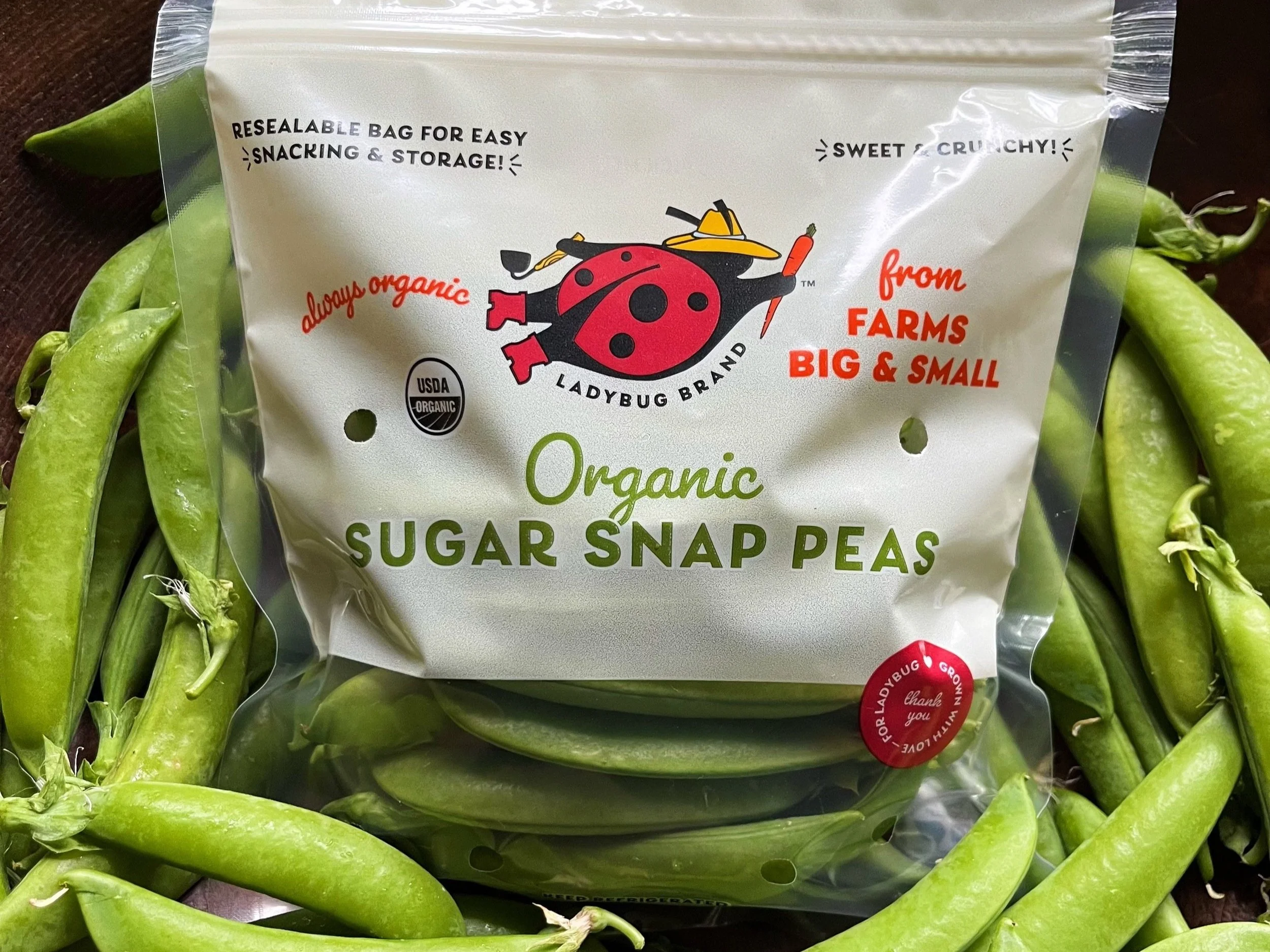 Meet the Newest Member of the Ladybug Brand Family: Organic Sugar Snap Peas 