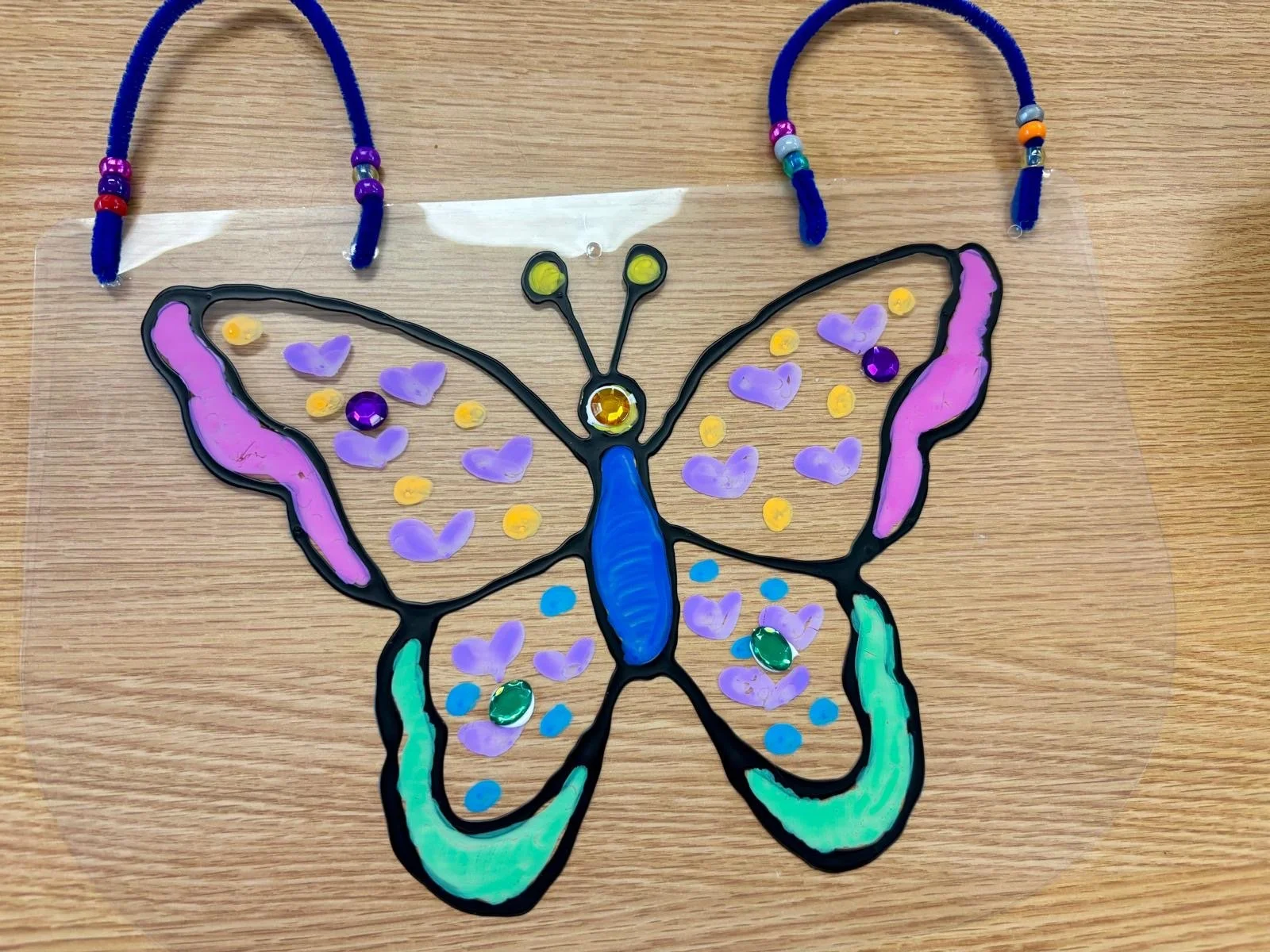 colorful butterfly sun catcher.JPG