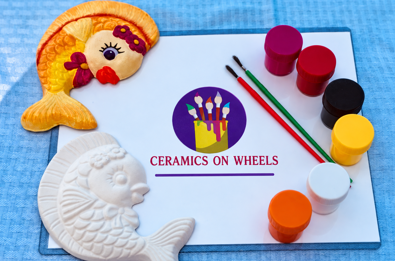 Ceramics on Wheels Painted Fish Display.png