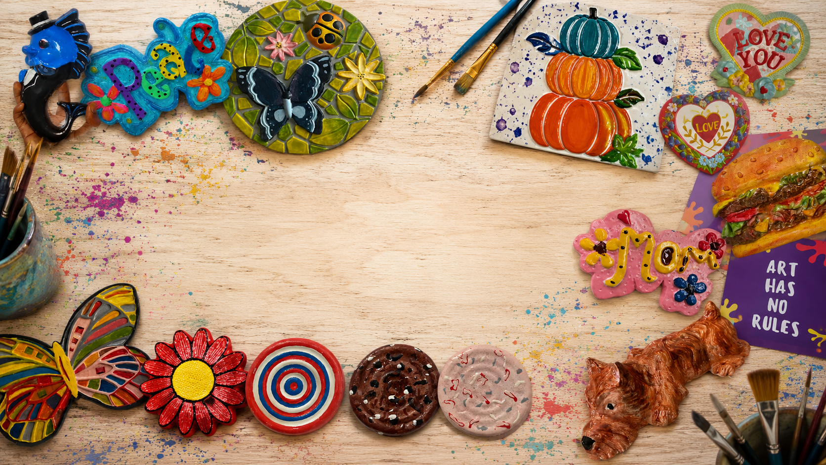 variety of colorful finished ceramic pieces  painted by different students