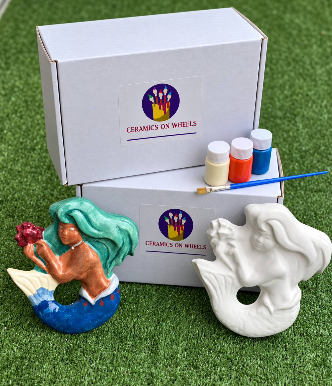 Mermaids, paint bottles, and ceramic boxes.png