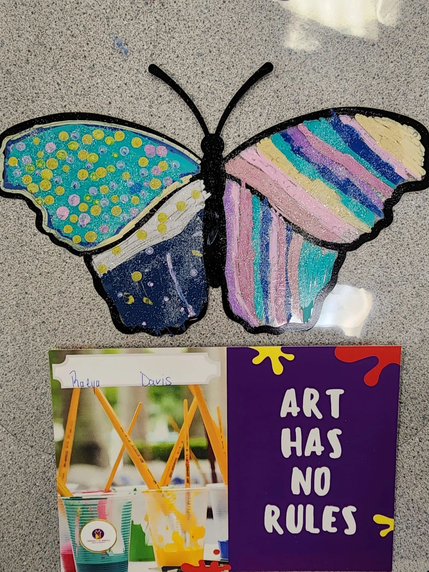 colorful butterfly sun catcher art experience for kids.jpg