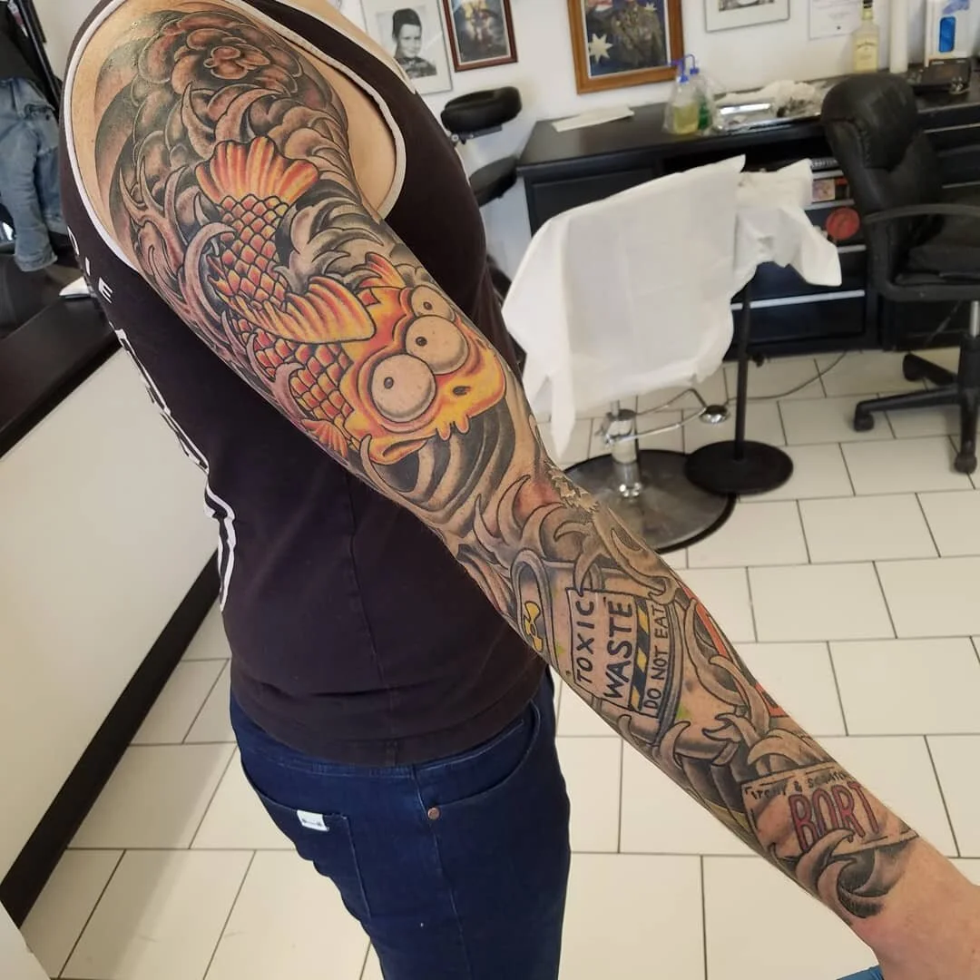 Finished up this super fun project with Brian today! Thanks buddy! #thesimpsons #simpsonstattoo