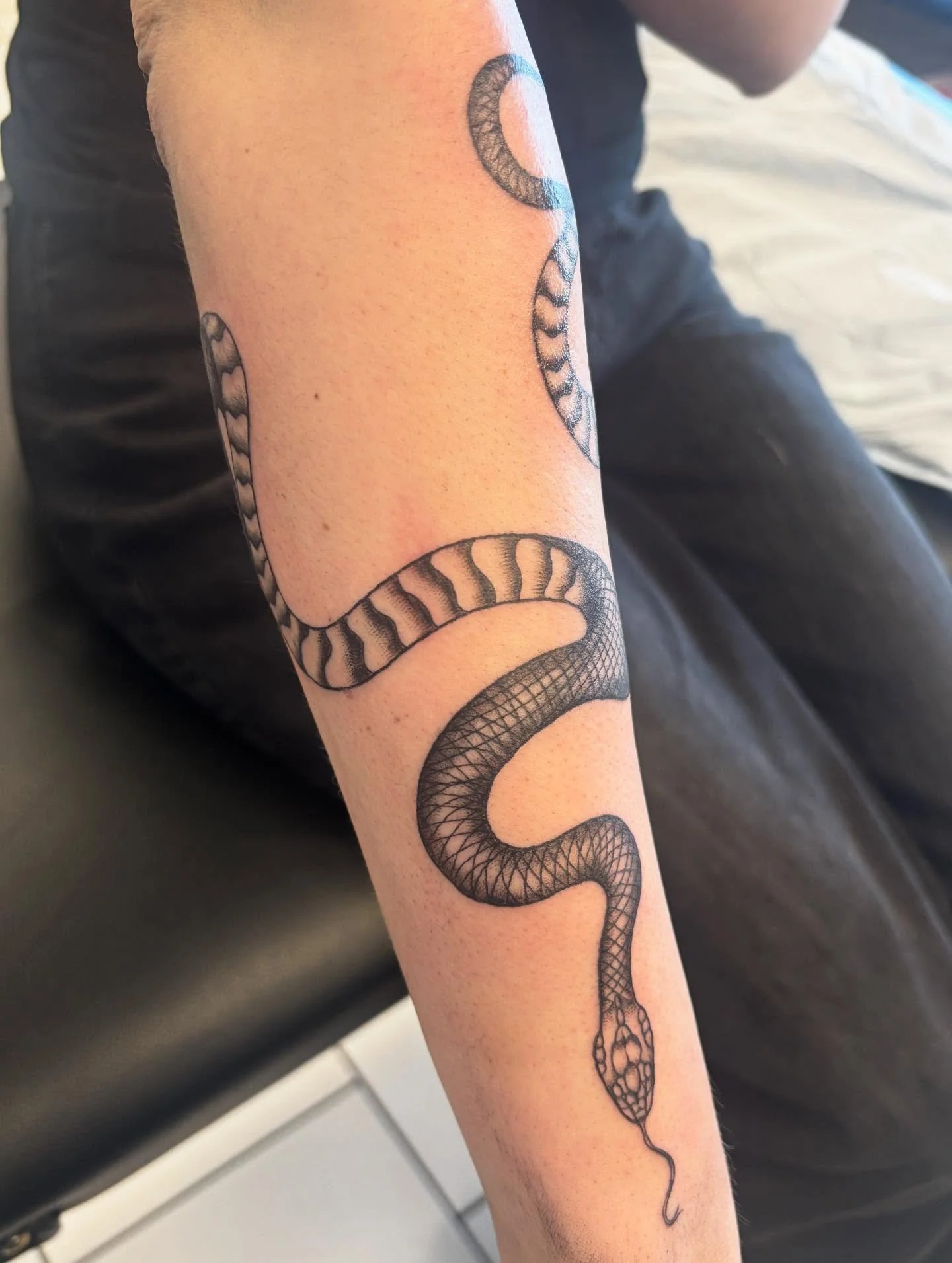 Badass snake wrap 🐍

#witattooartist #wisconsintattooartist #blackandgraytattoos #femaletattooartist #womentattooartists
