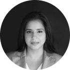 Black and white portrait of a woman in a blazer