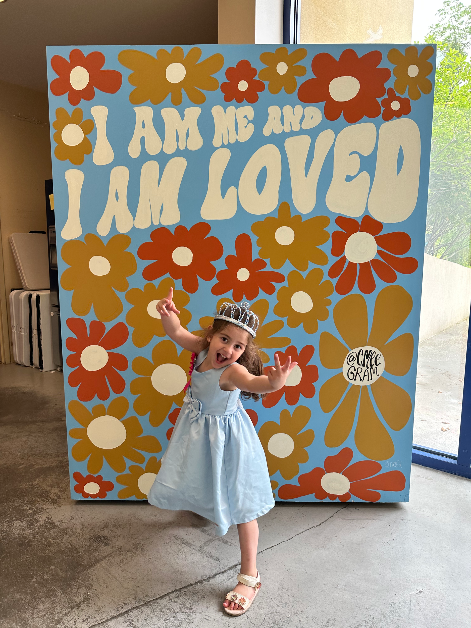CMEE Flower Wall: this mural was designed to be an ideal backdrop for littles ones visiting the Museum