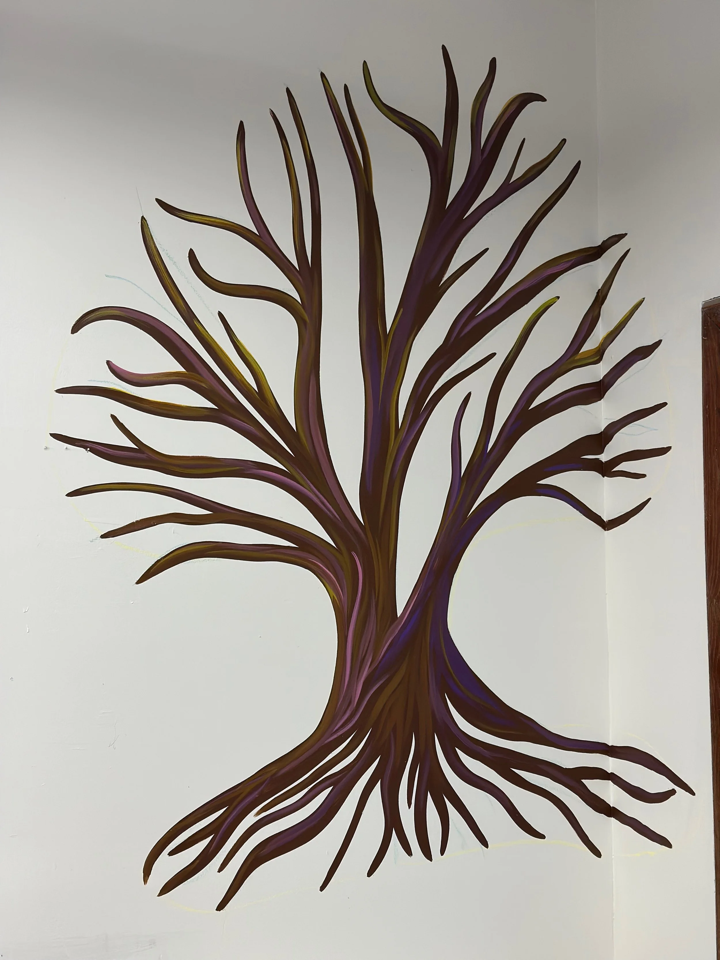 Ms. Hamill's Tree: a bloomless, leafless tree adorns the corner of Ms. Hamill's fourth grade classroom. Students are encouraged to add artwork and other projects to the branches throughout the seasons.