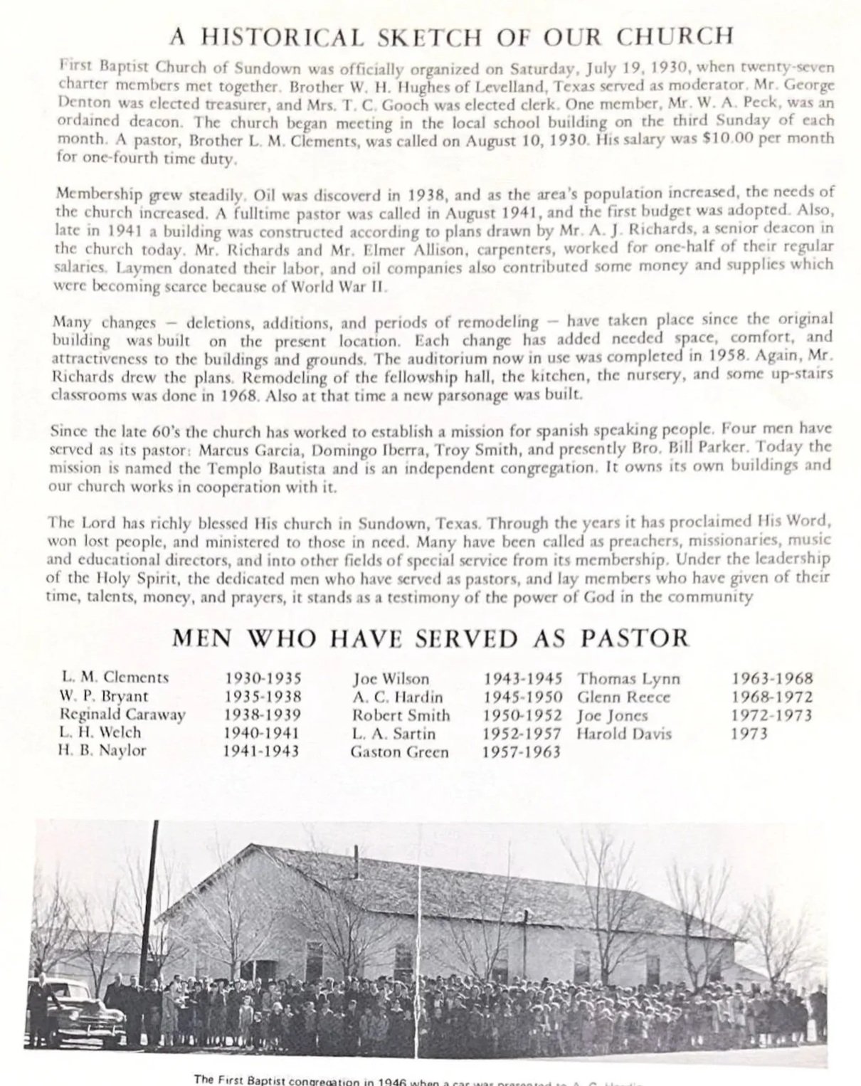 Black and white photograph of the first Baptist congregation in 1946, showing a large group of people gathered outside a church building, with some cars parked nearby.