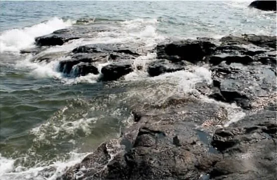 waves on rocks