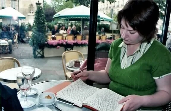 Rachel writing in Paris