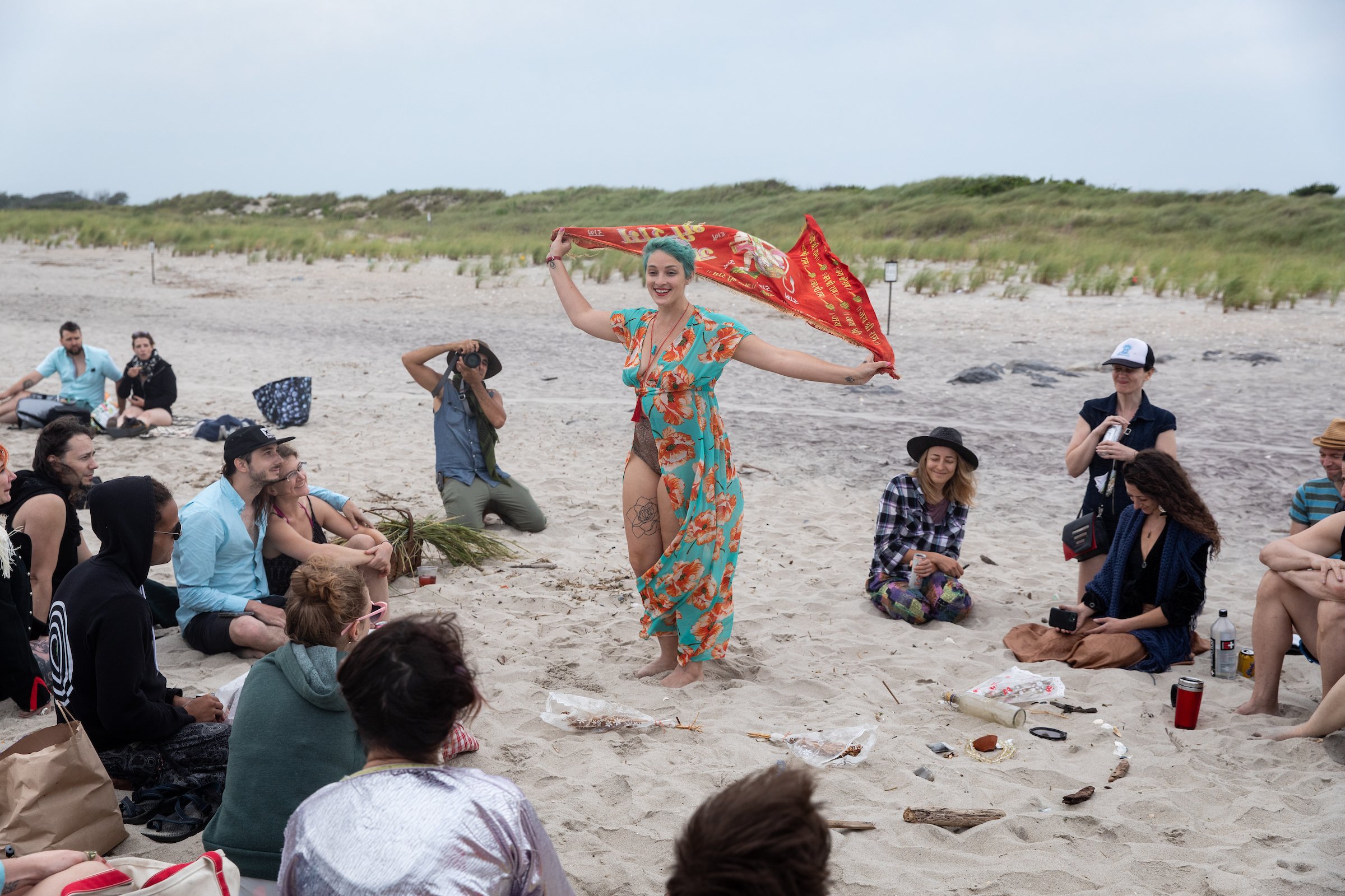 Misha performs with found objects gleaned from Jamaica Bay and invites others to join in on the newly woven tale. Photo by Walter Wlodarczyk