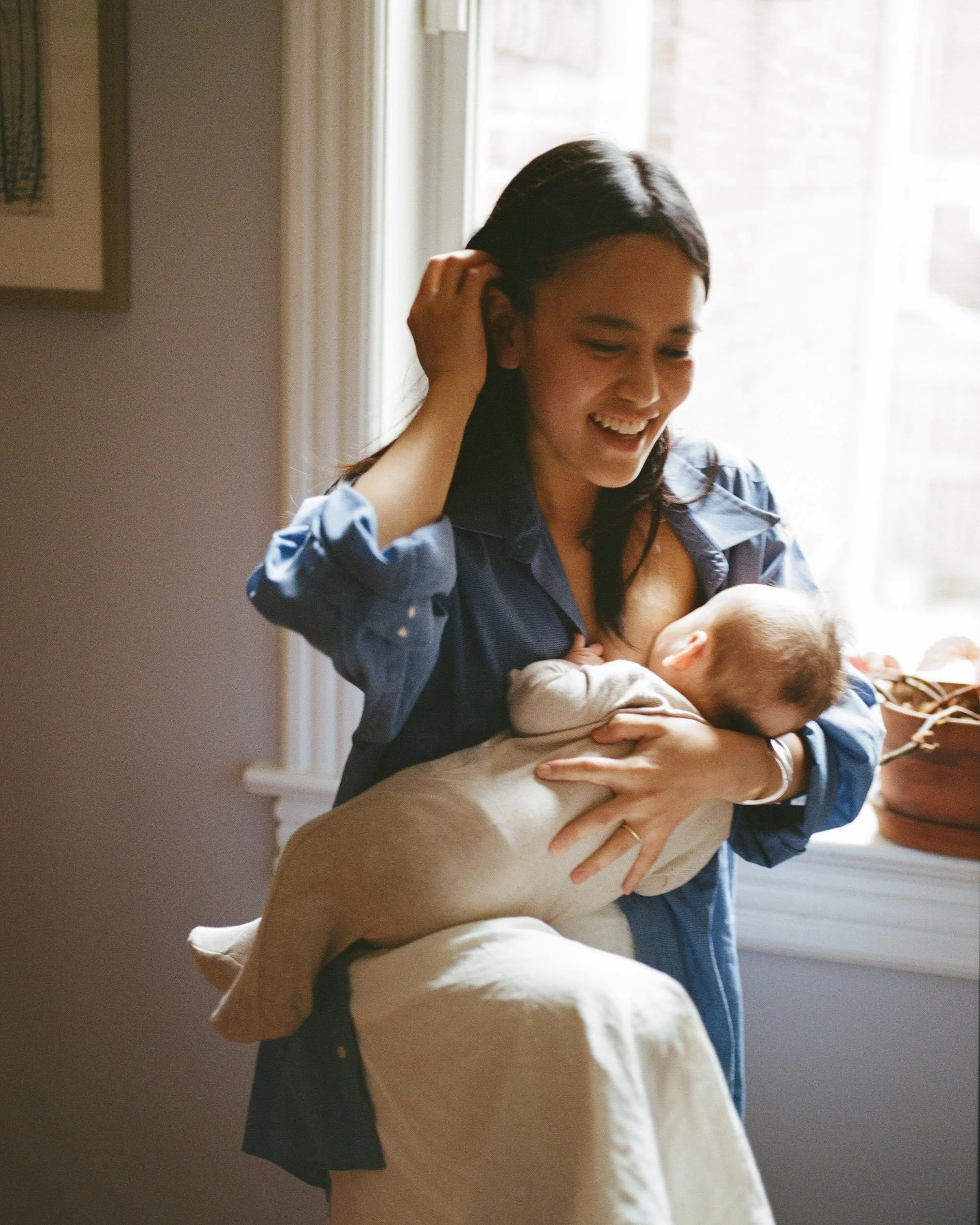 Home has a way of becoming invisible.

The parts of life that are easiest to overlook are so often the ones we'll miss the most.

I photograph families at home, on film. I hope I help them notice the beauty in the lives they are already living.

My O