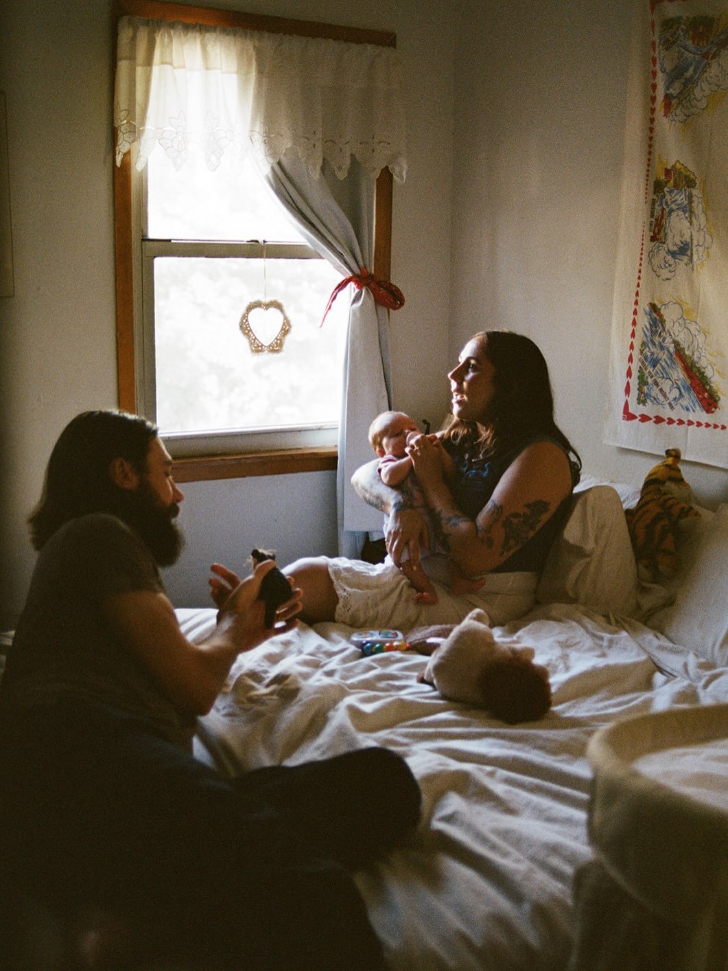 Gillian was on the turntable and Lonesome Dove was sitting on the bedside table.

I liked it there.

A Brooklyn newborn session on film.