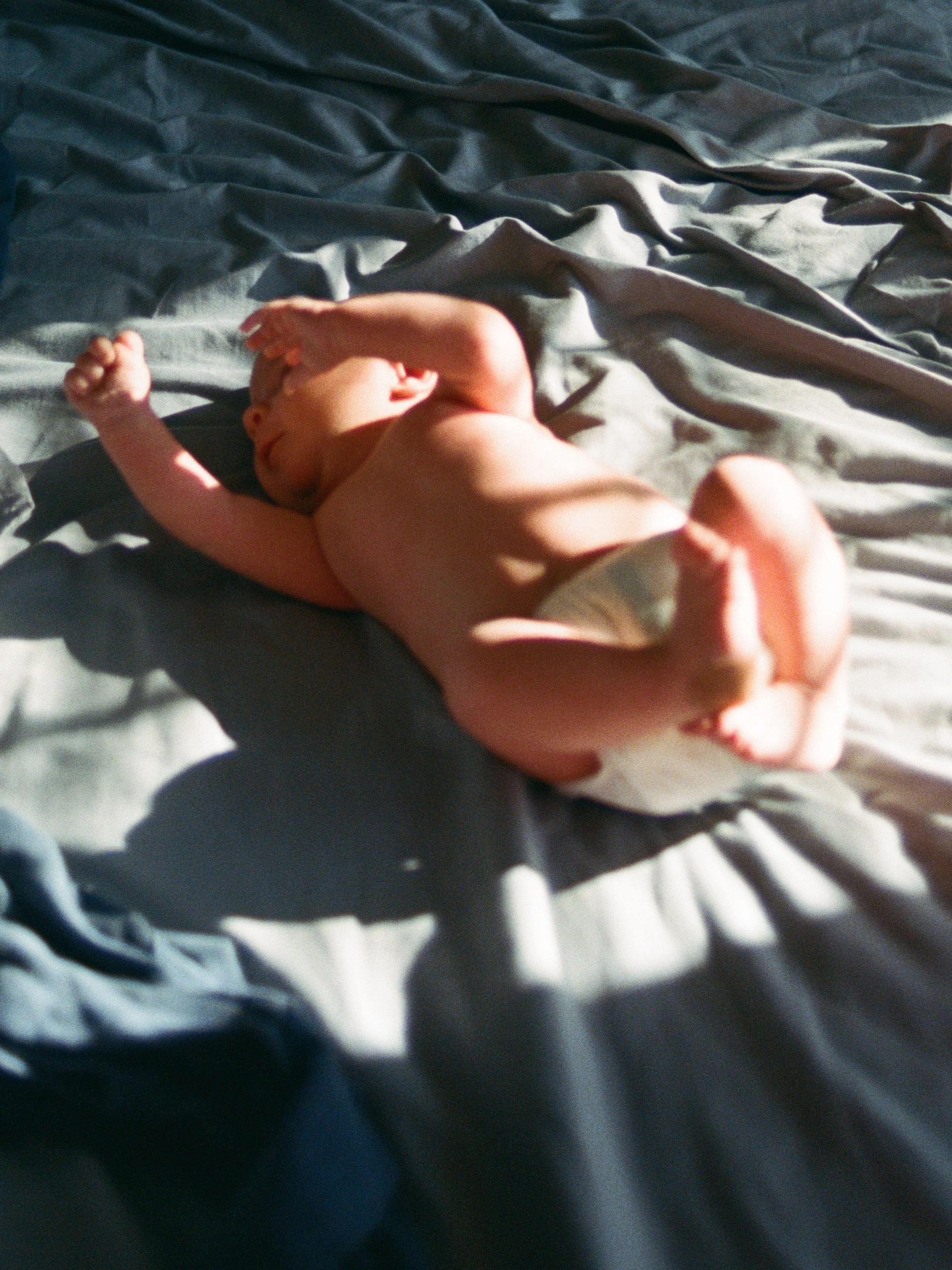 Welcome to the world, little baby. I hope you'll find it's gentle. 

Newborn session on film. Motherhood. Breastfeeding. Postpartum. Here for all of it.