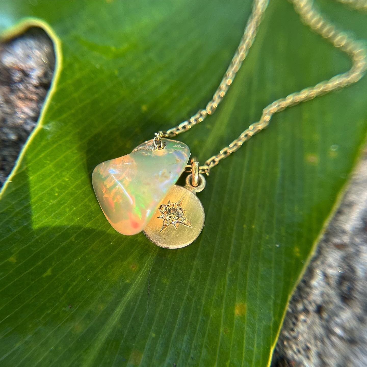 opal and gold charm necklace just listed on the site! Pure magic ✨ 🌈 🌟