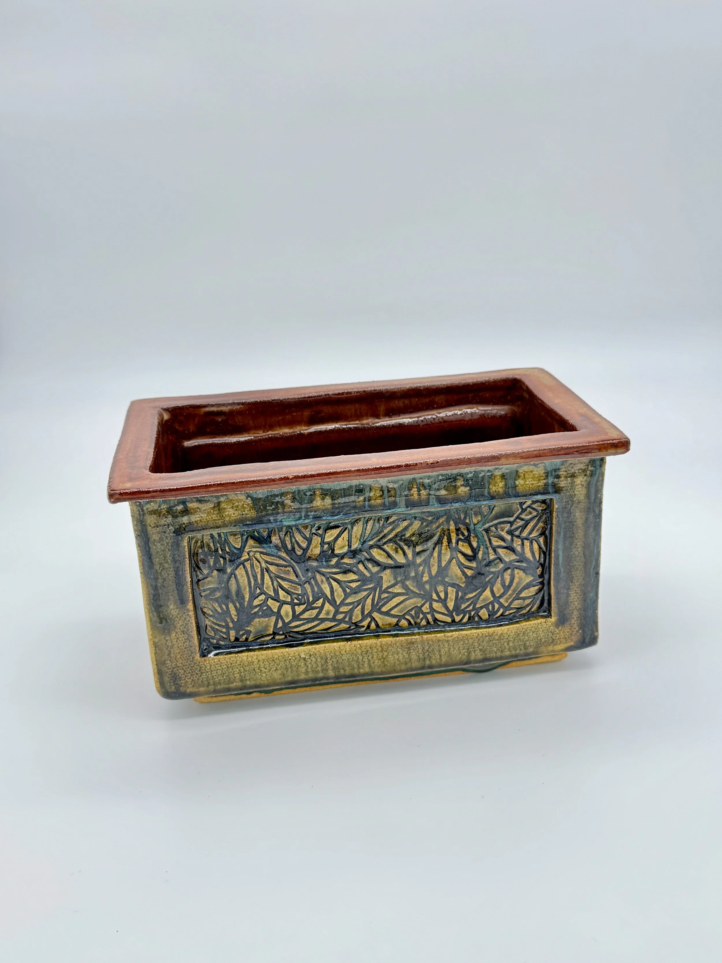 Slab Form with Framed Leaf Motif