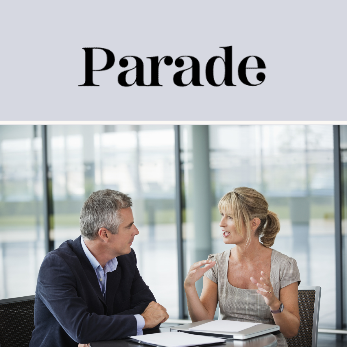 A man and woman talking at work