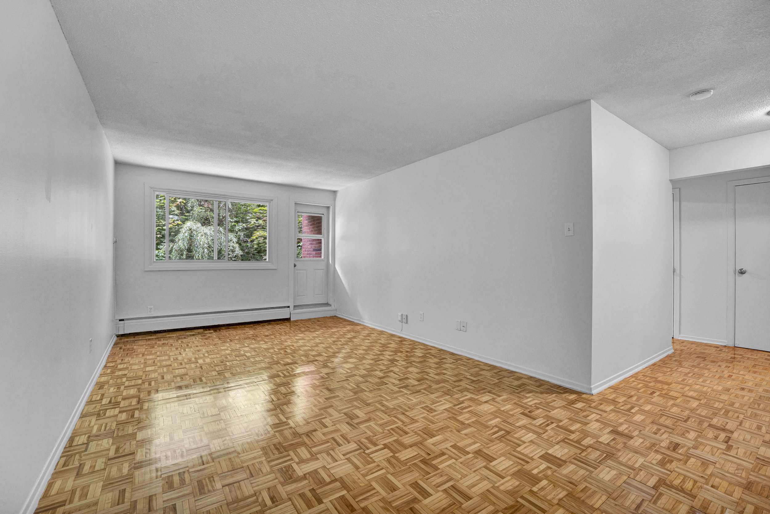 View professional interior and exterior real estate photography for 40, 45, and 55 Charles-Albanel apartment residences in Mont-Bleu, captured by Nvision 3D. See high-quality visuals that showcase multi-family rental properties.