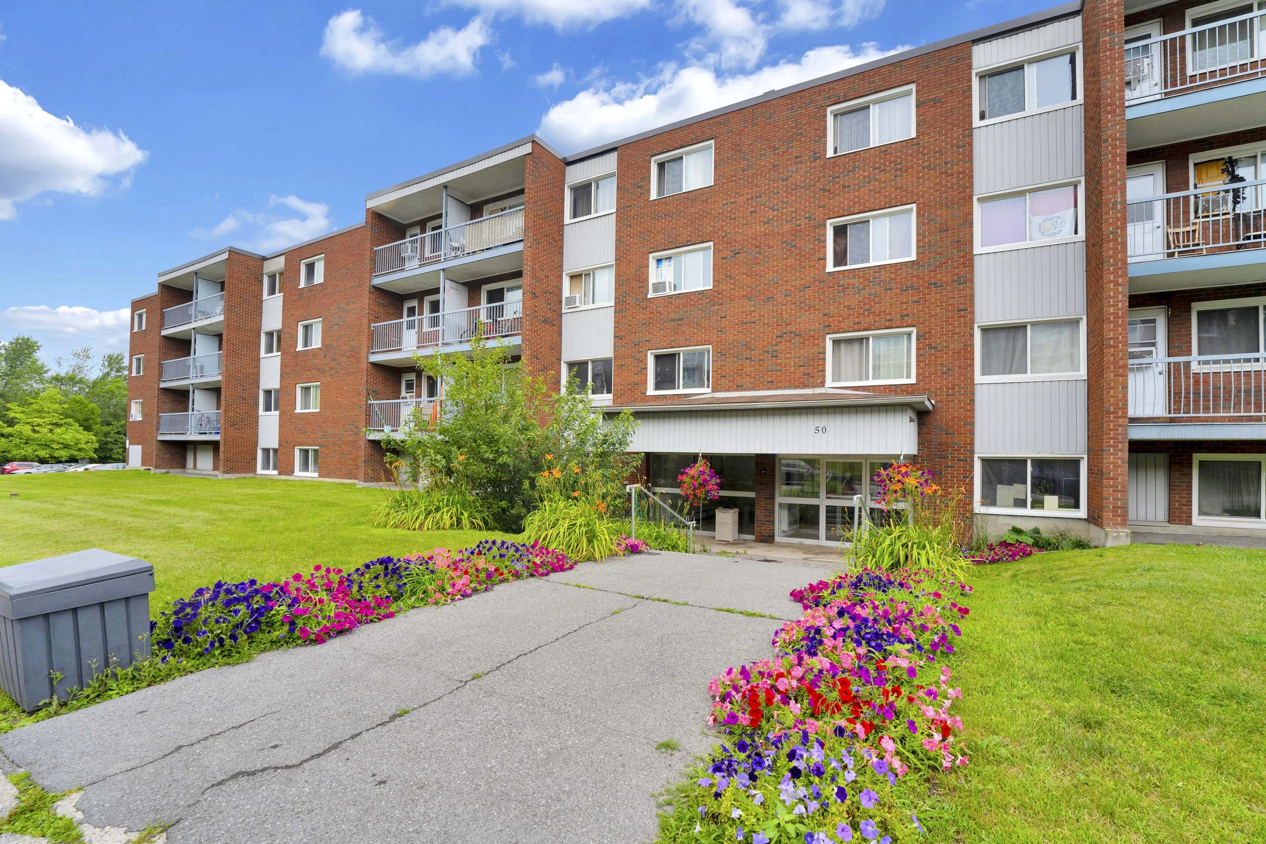 View professional interior and exterior real estate photography for 40, 45, and 55 Charles-Albanel apartment residences in Mont-Bleu, captured by Nvision 3D. See high-quality visuals that showcase multi-family rental properties.
