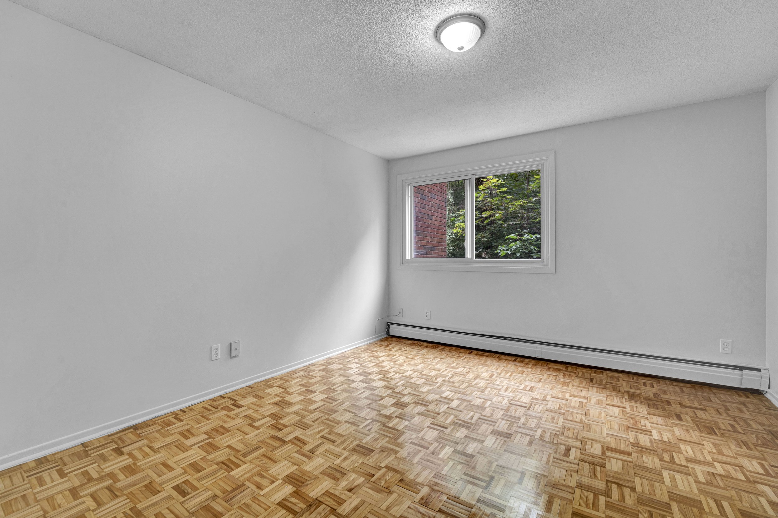 View professional interior and exterior real estate photography for 40, 45, and 55 Charles-Albanel apartment residences in Mont-Bleu, captured by Nvision 3D. See high-quality visuals that showcase multi-family rental properties.