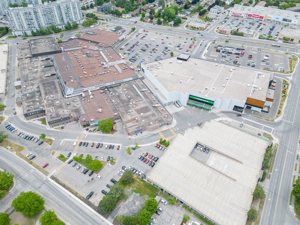 Aerial view of Carlingwood Shopping Center, its parking lots and surrounding Ottawa neighbourhood