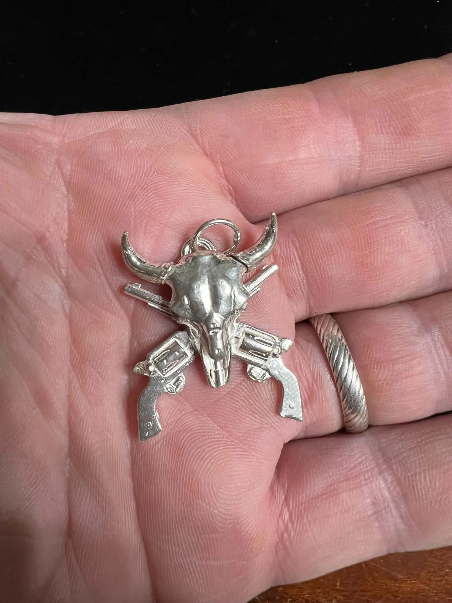 Sterling Silver Crossed Pistols and Buffalo Skull Pendant